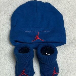 Air Jordan Blue Baby Beanie and Booties Set with Red Logo. Size 0-6 months